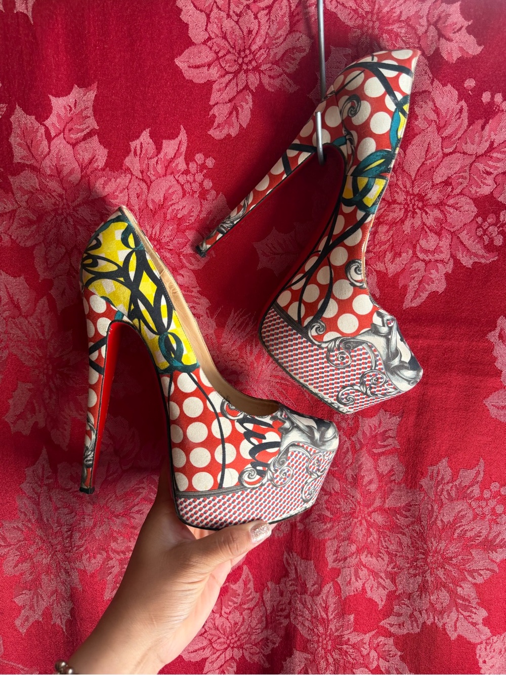 Christian Louboutin Daffodile 160 pumps featuring a vibrant "Loubi Print"